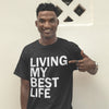 Black shirt says Living my best life, motivational shirt