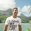 White shirt says Living my best life, motivational shirt